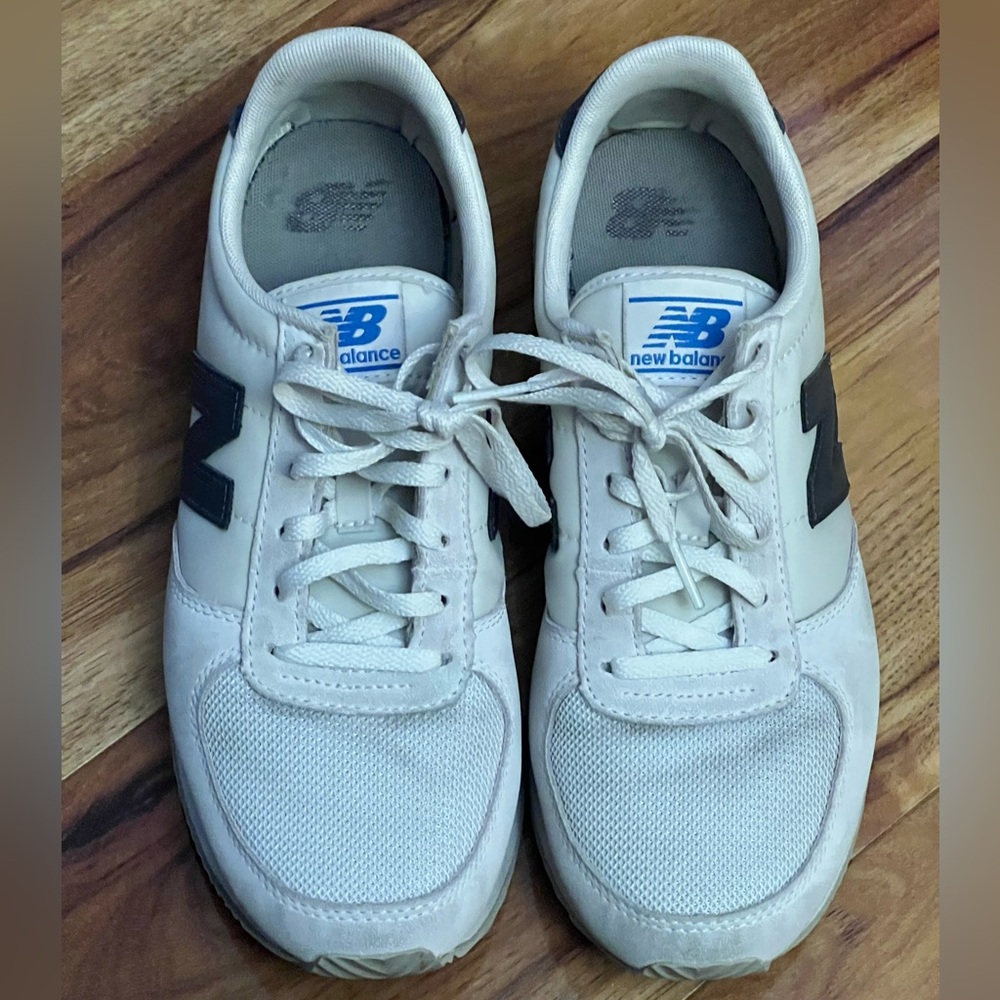 Trendy & comfy white, pink, and grey New Balance sneakers.